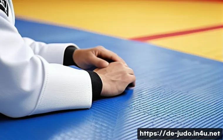 유도 도복 커스터마이징 - A confident adult male judoka wearing a custom-fitted white judogi with subtle blue color accents on...